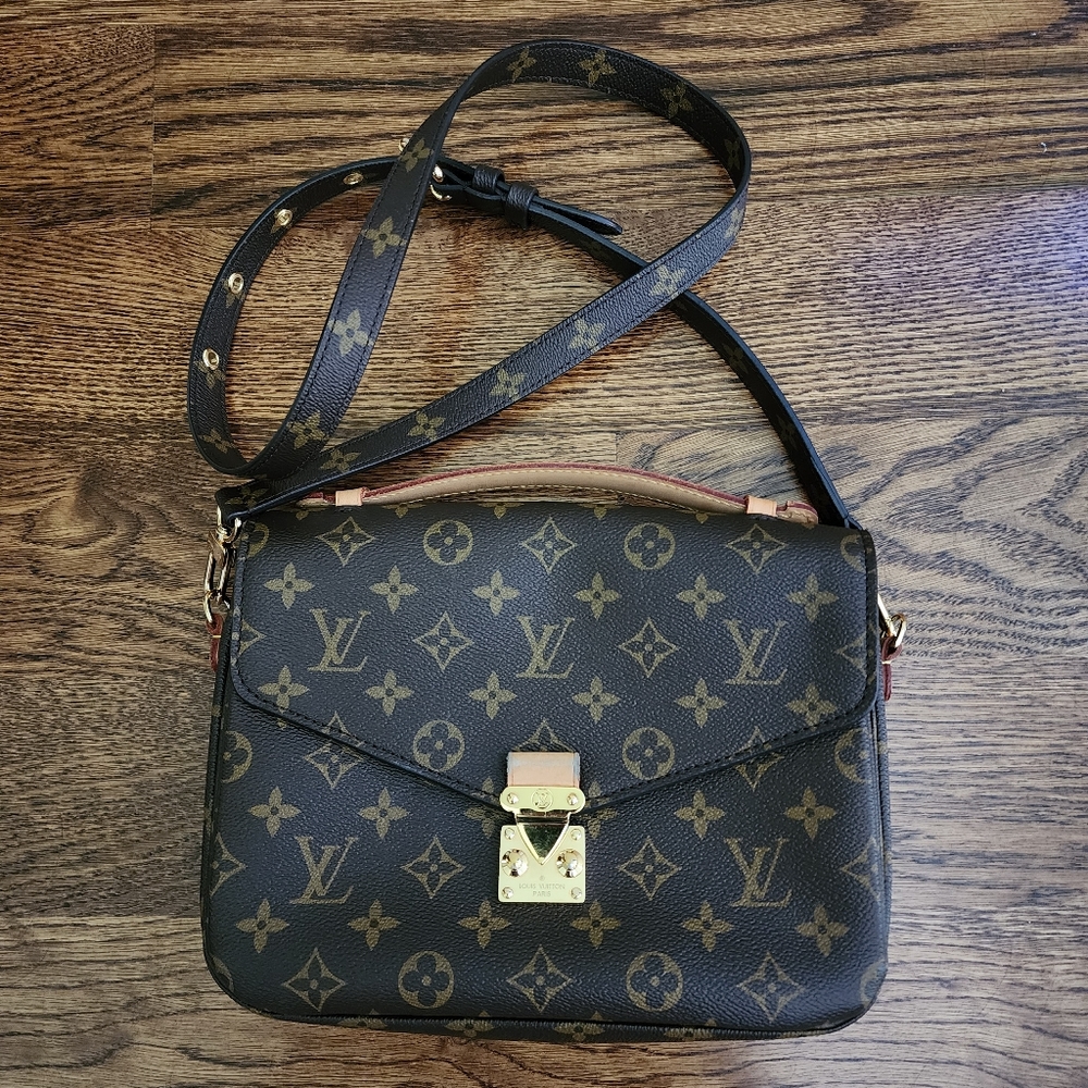 Sold LOUIS VUITTON Monogram Canvas Pochette Metis Bag